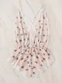 Dettaglio di pagliaccetto a fiori con pizzo a ciglia bianco e spalline incrociate sul retro - S / Floreale Blu