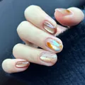 Uñas postizas cortas y redondas con efecto ojo de gato ámbar y lunares oro champán - Set en Caja
