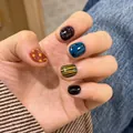 Short press-on nails with irregular patterns, retro dots and stripes in contrasting colors - Boxed Style