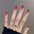 Burgundy gradient long oval press-on nails with golden shimmer for elegant manicure - Boxed Style