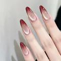 Macro detail of almond nails with cat-eye effect and wine red gradient finish - Red And Nude Gradient / Press On Nails (Boxed Style)