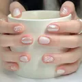 Pink press-on nails with bow and rhinestone details on a short round shape - M / Blue Bow Cat Eye (BY2345)