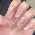 Macro detail of long ballerina press-on nails with nude pink cat-eye glitter finish - Twinkling Star (Liquid Glue)