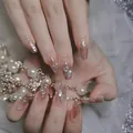 Pink gradient press-on nails in long coffin shape with pearls and silver glitter accents - Phototherapy Glue Style / Brilliant Beads (BY1194)