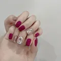 Glossy purple and glitter press-on nails set with large pink rhinestone accents - Phototherapy Glue Style / 24 Pcs/Set / Purple Elegance (BY1209)