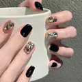 Detailed view of short square press-on nails with black finish, rose gold glitter and rhinestones - Size M (10 Pcs + Tool Kit) / Scattered Clouds Style (BY1293)