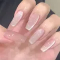 Macro shot of long coffin nails featuring nude pink gradient and silver cat-eye glitter finish - Phototherapy Glue Style / 24 Pcs/Set / Shimmering Starlight (BY1297)