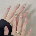 Cat eye press-on nails with pink gradient and small rhinestone accents on square tips - Boxed Style