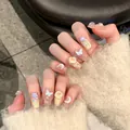 Detail of handmade butterfly press-on nails with cream yellow and blue gradient glitter - Dreamy Star Moon 3D Butterfly Coffin Style (BY1387)