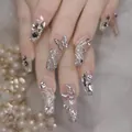 Sparkly silver press-on nails with 3D metal butterfly, pearls and rhinestone details - Phototherapy Glue Style / Dazzling (BY1251)