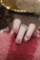 Detailed view of red gradient press-on nails with 3D butterfly and silver rhinestones - Phototherapy Glue Style / Red Purple Butterfly Style (BY1359)