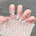 Blue cat eye press-on nails with pink 3D bows, leopard hearts and pearls on almond shape - Exquisite Flower Style (BY2193) / Handmade Nails Size M