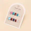 Detalle del set de uñas postizas con flores de dibujos animados y patrones de ojos brillantes - Estilo Pegamento de Fototerapia / Multicolor de Ensueño