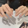 Macro detail of aurora cat-eye gradient almond nails with iridescent shimmer and shine - Rainbow Radiant Style (BY1516) / Prefabricated Nail Strip