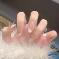 Close-up of pink gradient press-on nails with silver butterfly and rhinestone details - Handmade Nails (Size M/10 Pieces Pack) / Starry Pink