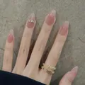 Macro detail of almond gradient press-on nails with silver rhinestone chain accents - Boxed Style