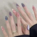 Close-up of cat-eye effect press-on nails with purple and pink gradient glitter finish - BY1611 Style Boxed