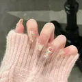 Detail of long ballerina nails with nude pink base, colorful beads, and fireworks pattern - Colorful Fireworks Style (BY1980) / 30 Packs / Nude Pink Fireworks