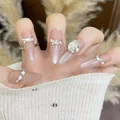Pink stiletto press-on nails with white cat-eye gradient and sparkling gemstones - Immortal Beauty (BY2233)