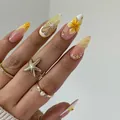 Unghie finte a mandorla 3D a tema oceano e frutta con limoni e stelle marine - Tipo di Colla / Luce Solare Giallo Arancio
