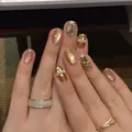 Handmade gold press-on nails with pearls, glitter, and cat-eye finish in vintage short style - M / Ten Pieces Per Bag / Golden Glitter Pearl Style (BY2476)