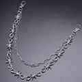 Detail of silver double-layered punk pants chain with barbed wire and paperclip links - Silver