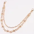 Detail of golden double-layer punk waist chain with barbed wire design and lobster clasps - Double Layer Barbed Wire Chain / Gold