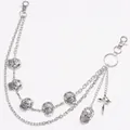 Close-up of multilayered silver metal pant chain with skull charms and cross pendant - Silver Multi-Layer Skull Trouser Chain