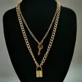 Double-layered golden necklace set featuring a key pendant and a Cuban link lock pendant - Style 2 (Double Layer Key Lock Necklace) / Gold