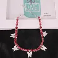 Detailed close-up of butterfly anklet with pink rhinestones and silver-tone lobster clasp - Large Pink Zircon Silver