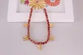 Gold butterfly anklet featuring vibrant pink rhinestones and dainty insect charms - Large Pink Zircon Gold