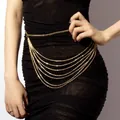 Multilayer gold metal waist chain with elegant tassels for women on black dress - Gold