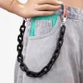 Punk style bold black acrylic pants chain with metallic silver lobster clasps on denim - Black