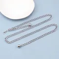 Detail of silver S-shaped metal chain belt with lobster clasp and round ball pendants - Silver Metal Ball Style