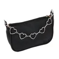 Close-up of heart-shaped silver chain and embossed cartoon texture on black leather bag - Single Layer Large Heart Bag Chain