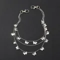 Detailed view of silver triple-layered metal pant chain with butterfly charms and lobster clasps - Butterfly Multi-layer Pants Chain