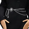 Detail of silver triple-layered metal waist chain featuring sun face pendant and lobster clasp - Thick Chain Silver Sun Waist Chain