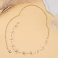 Bohemian gold sun pendant waist chain belt with lobster clasp on beige background - Gold Single Layer Small Sun Waist Chain