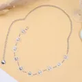 Silver metal waist chain featuring sun and moon pendants with adjustable extender link - Silver Single Layer Small Sun Waist Chain
