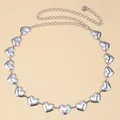 Detail of silver heart-shaped embossed metal belt with adjustable lobster clasp chain - Heart Style / Silver Heart