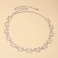 Close-up of hollow butterfly links and lobster clasp on silver metal waist chain - Hollow Butterfly Style / Silver Hollow Butterfly