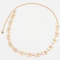 Detailed macro shot of golden hollow butterfly waist chain with lobster clasp and link texture - Butterfly Design / Gold Butterfly