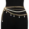 Close-up of multilayer gold body chain with white pearls and sparkling rhinestones - Gold