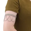 Silver boho arm cuff with dangling chains and tassel detail for women - Bohemian Tassel Style / Silver