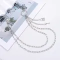 Detail of silver double layer trouser chain with skull key and rhinestone lock pendant - Silver