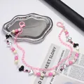 Pink acrylic layered beaded pant chain with silver heart charm and cross beads - Pink Beaded Style
