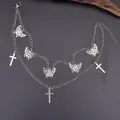 Detail of silver double-layered boot chain with hollow butterfly and cross pendants - Silver