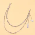 Detail of silver layering chain with butterfly and feather charms for trousers - Silver