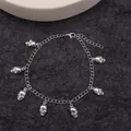 Punk silver metal chain accessory with seven detailed skull pendants and lobster clasp - Silver
