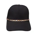 Close-up of black baseball cap featuring a decorative gold metal chain on the brim - Gold Double O-Chain